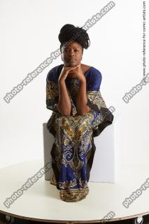Dina Moses African Woman Sitting Pose